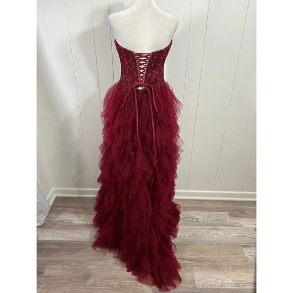 Prom Bay size 6 prom dress in the color wine. Corset with Lace up back & Ruffles - Picture 4 of 9